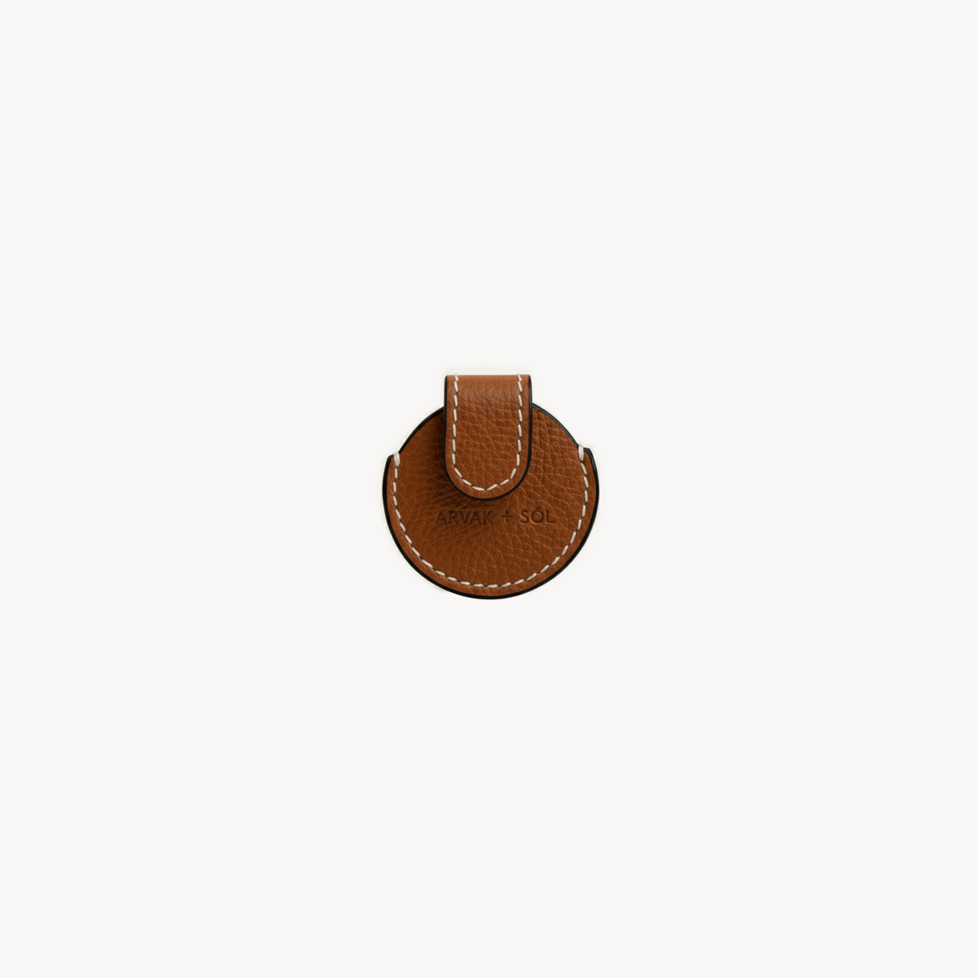 Saddlebrown Arvak + Sól Airtag case with protective silicone cover for tracking device, designed for durability and style.