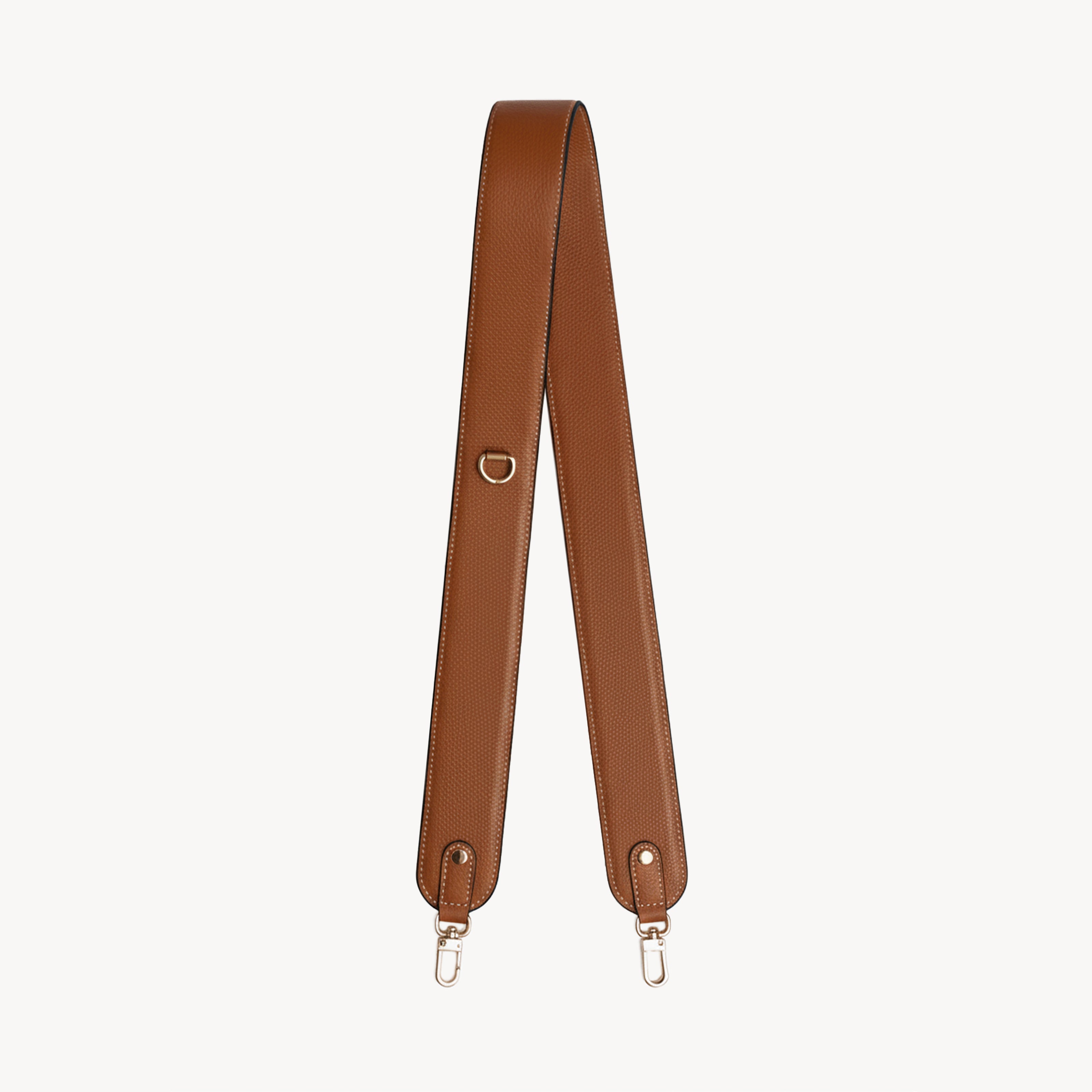 Saddle brown Arvak + Sól bag strap with adjustable leather design for versatile use and secure fit.