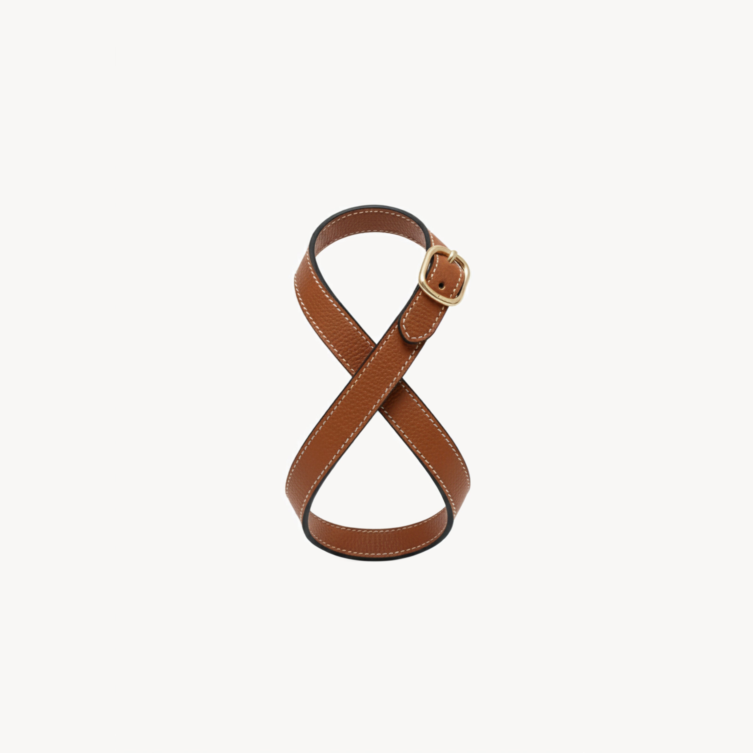 Saddle brown Infinity Harness by Arvak + Sól featuring adjustable straps and durable leather design.