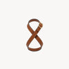Saddle brown Infinity Harness by Arvak + Sól featuring adjustable straps and durable leather design.