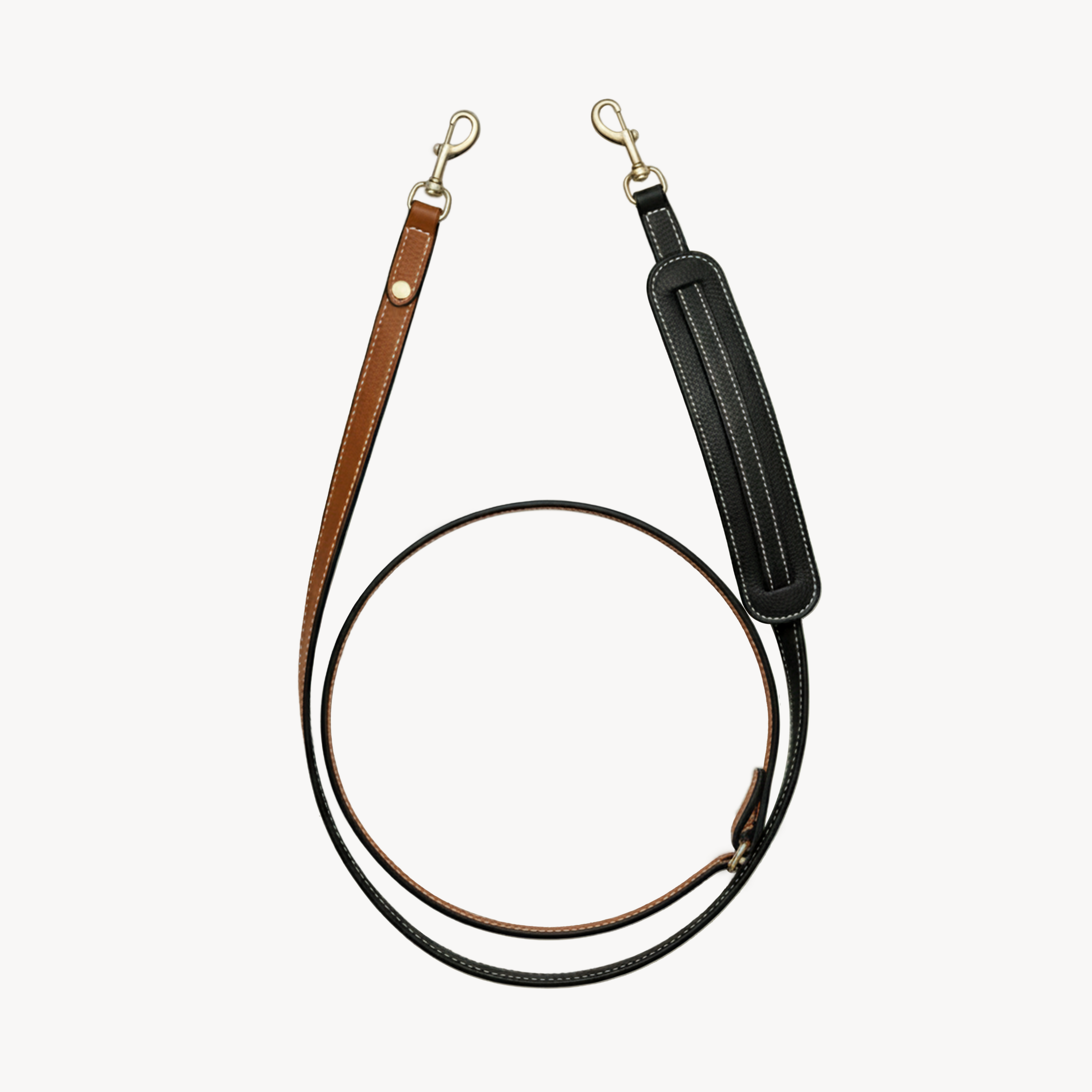 Arvak + Sól hands-free cross body leash in saddle brown and black, adjustable dog leash with secure strap for convenient walking.
