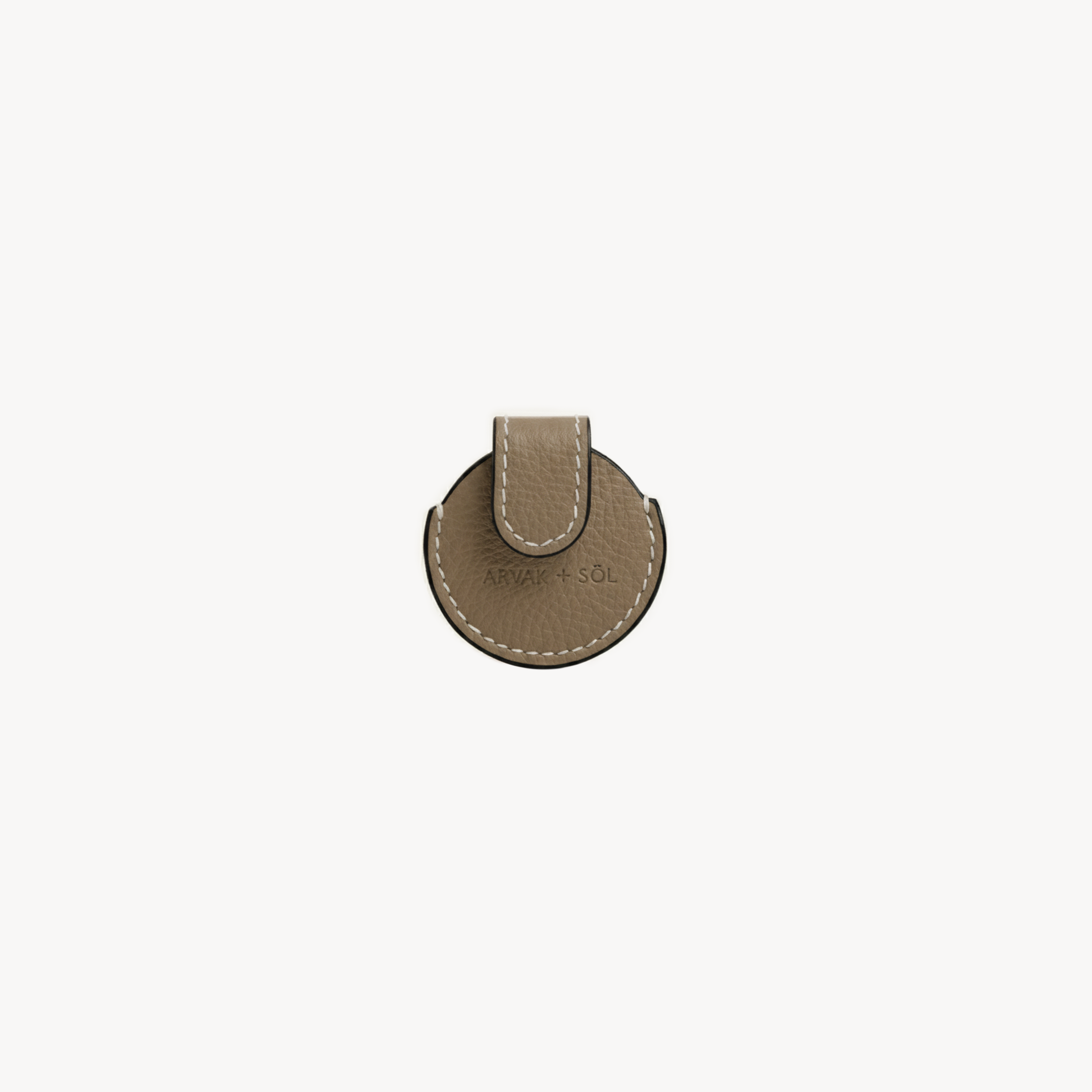 Taupe Arvak + Sól Airtag case showing a sleek, protective silicone cover for Apple AirTag with brand logo details.