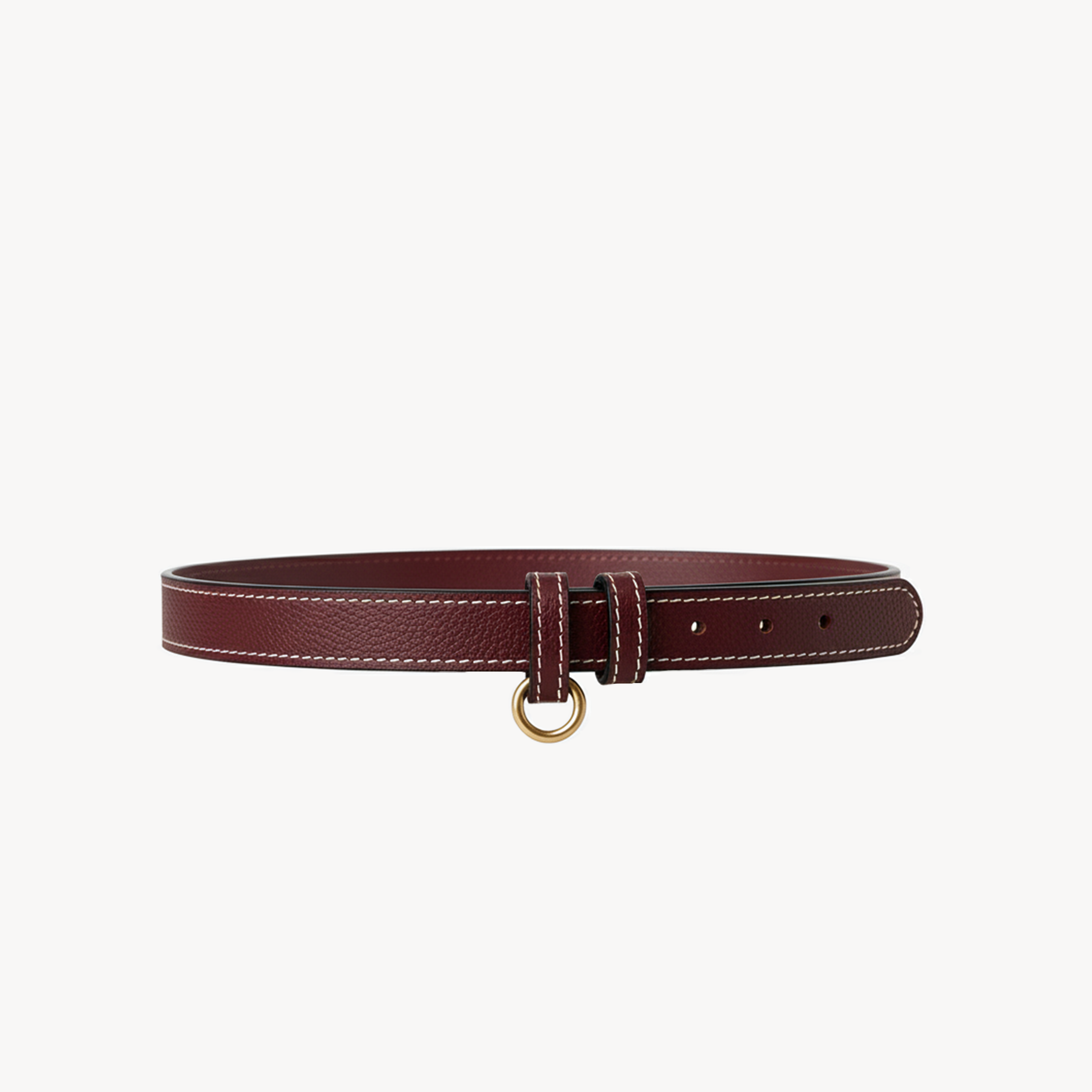 Burgundy leather belt by Arvak + Sól with a metal buckle, stylish accessory for casual and formal outfits.