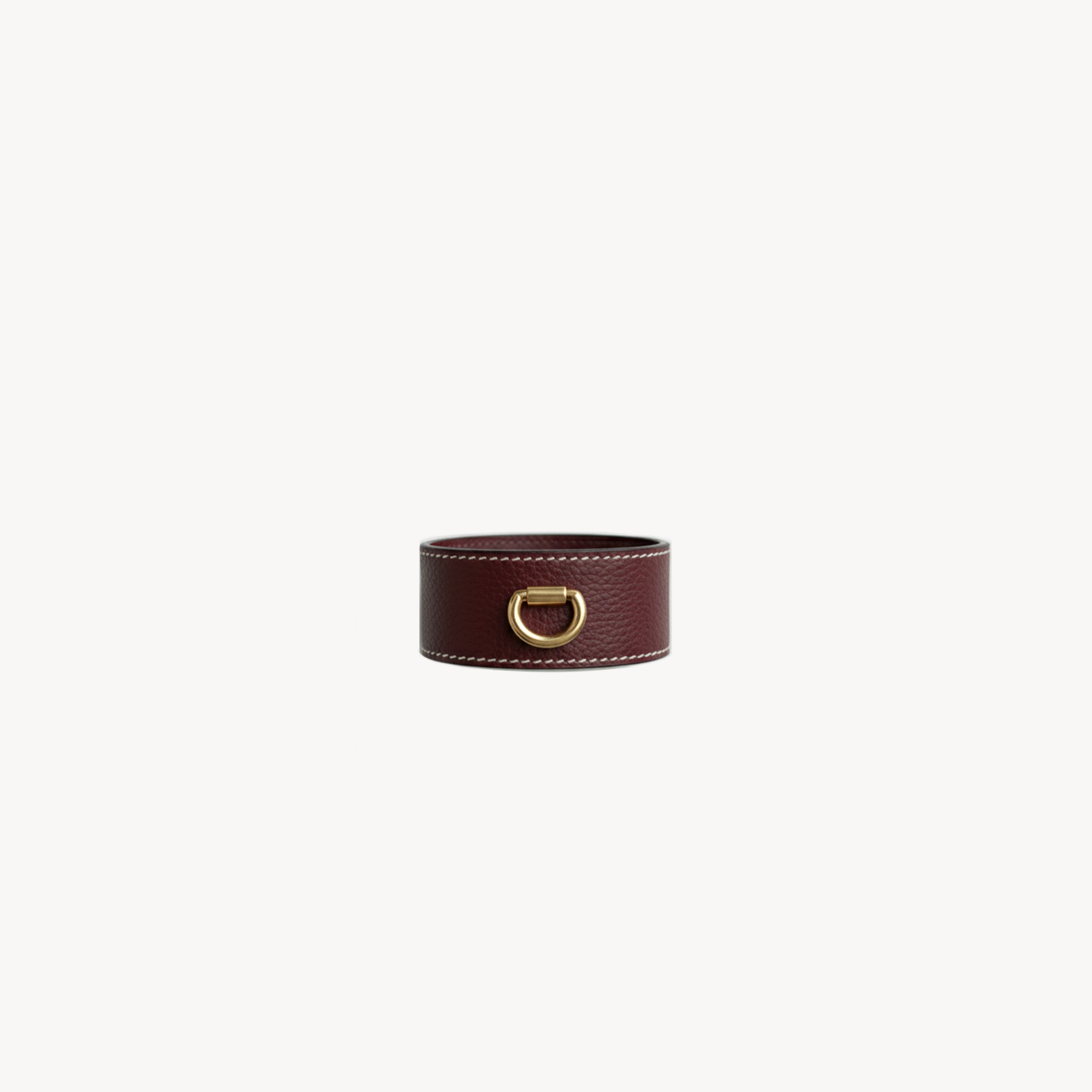 Arvak + Sól burgundy cuff bracelet with textured metal design and adjustable fit, stylish accessory for wrist.