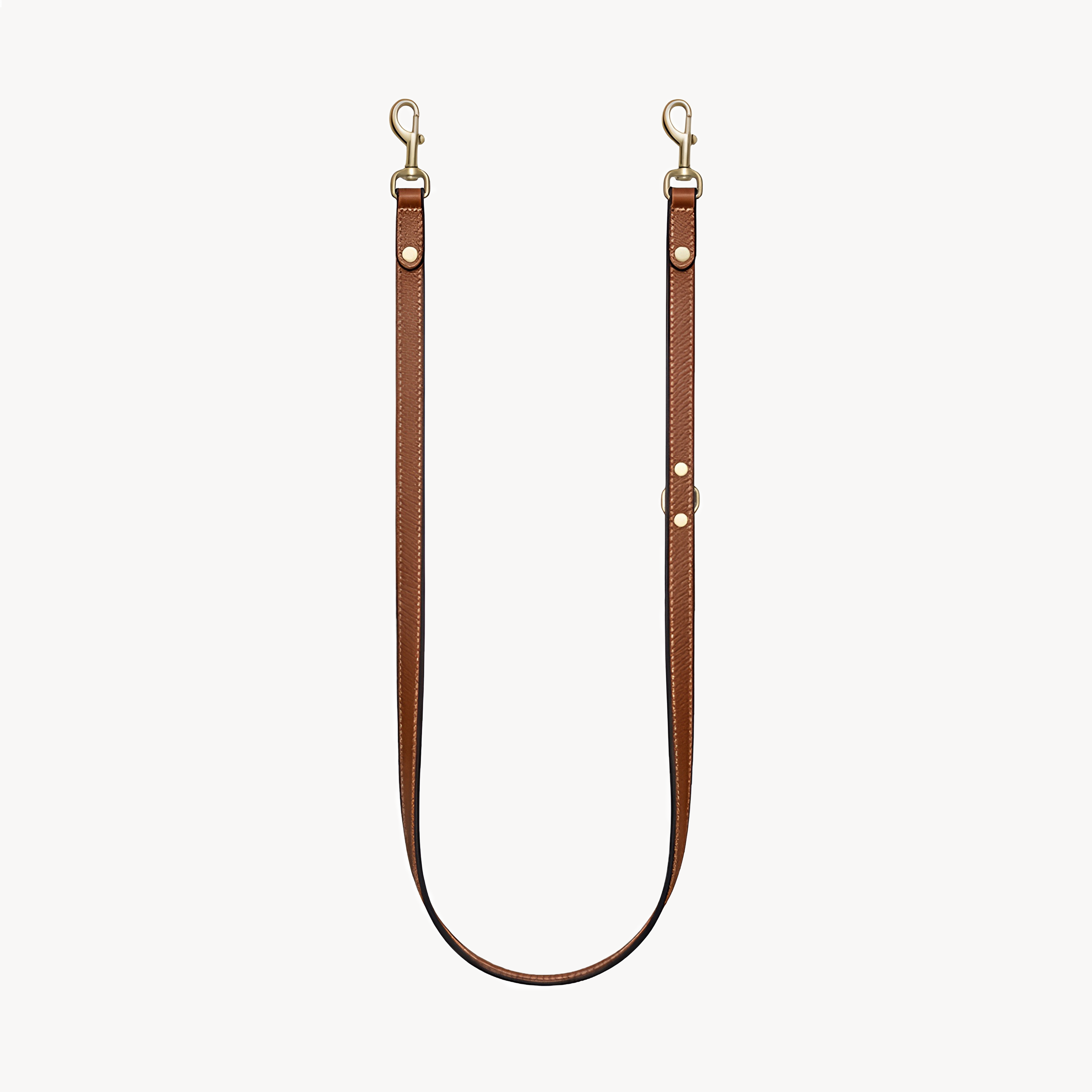 Double-ended leather leash by Arvak + Sól in saddle brown, featuring sturdy metal clasps and durable leather construction.
