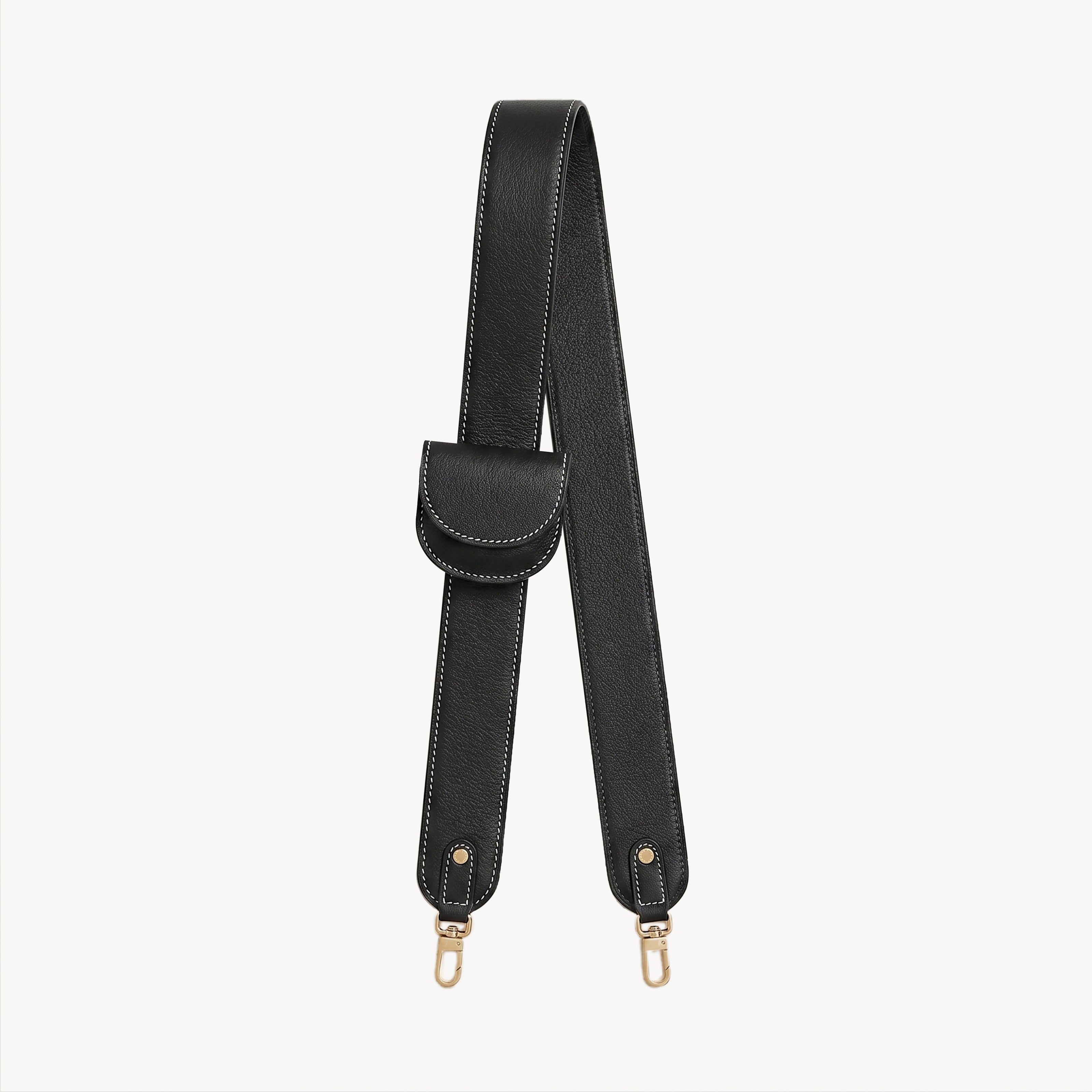 Black Arvak + Sól bag strap and folding wallet set, featuring sleek, durable accessories with adjustable strap and compact wallet design.