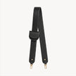 Black Arvak + Sól bag strap and folding wallet set, featuring sleek, durable accessories with adjustable strap and compact wallet design.