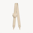 Cream-colored bag strap and folding wallet set by Arvak + Sól, featuring stylish, textured leather accessories.