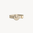 Cream leather Not Your Classic Collar Airtag case by Arvak + Sól, designed to hold and protect your AirTag.