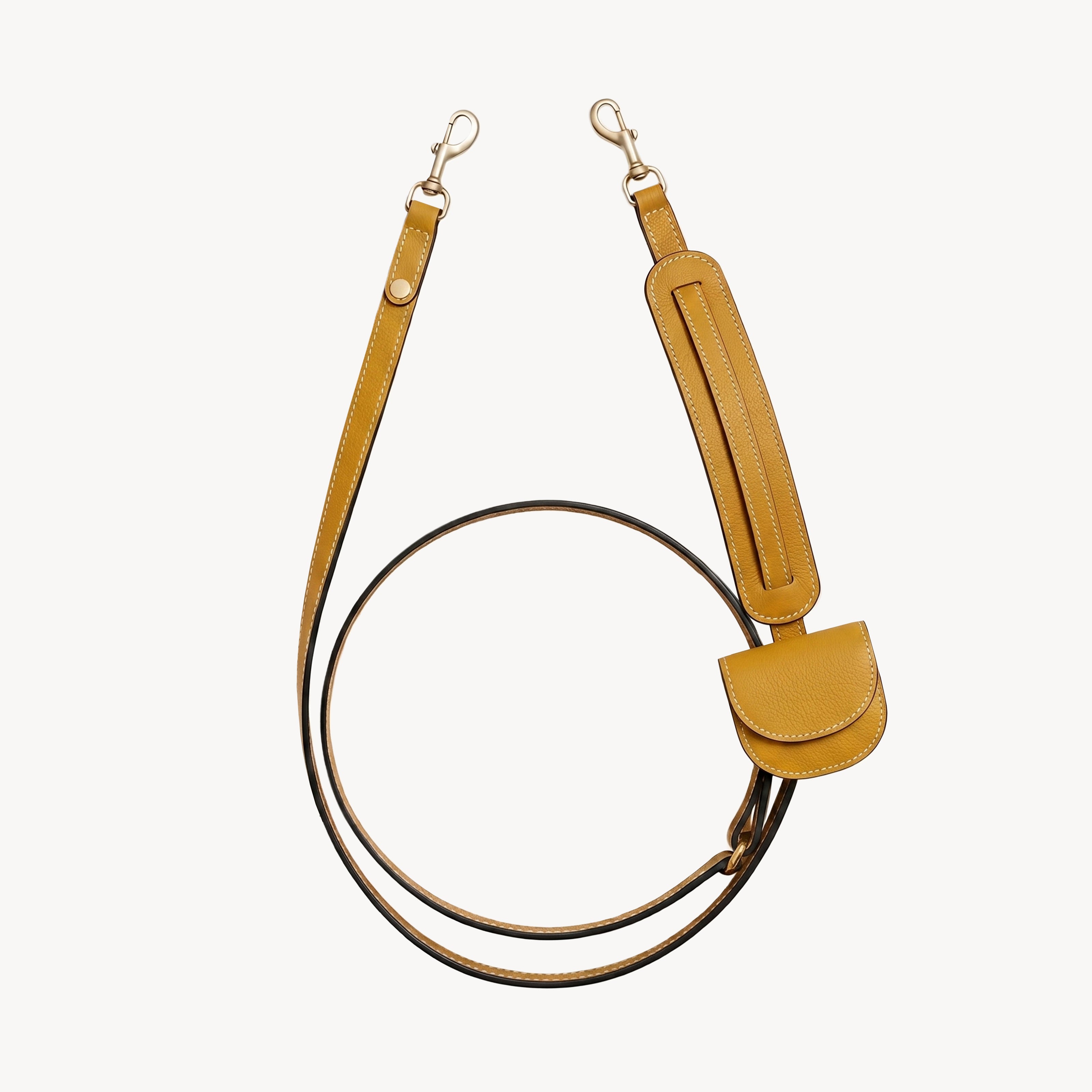 Arvak + Sól hands-free leash and folding wallet set with mustard-colored crossbody leash and compact wallet.