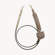 Taupe hands-free leash and folding wallet set by Arvak + Sól, featuring a cross-body leash and compact wallet for everyday use.