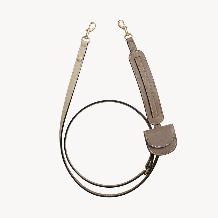 Taupe hands-free leash and folding wallet set by Arvak + Sól, featuring a cross-body leash and compact wallet for everyday use.