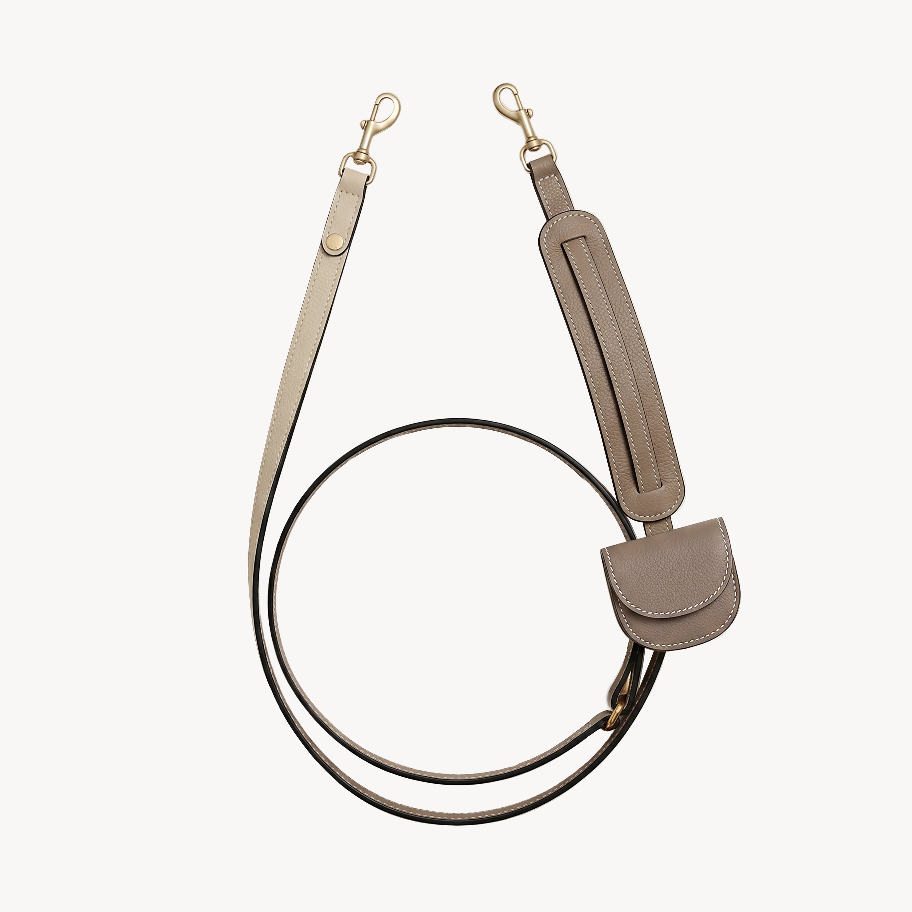 Arvak + Sól hands-free leash and folding wallet set in taupe, featuring a cross-body leash and compact wallet for convenient carrying.