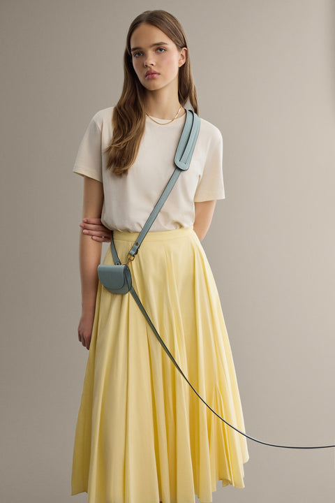 Hands-free leash and folding wallet from Arvak + Sól, showing compact design with handle and wallet folded open.