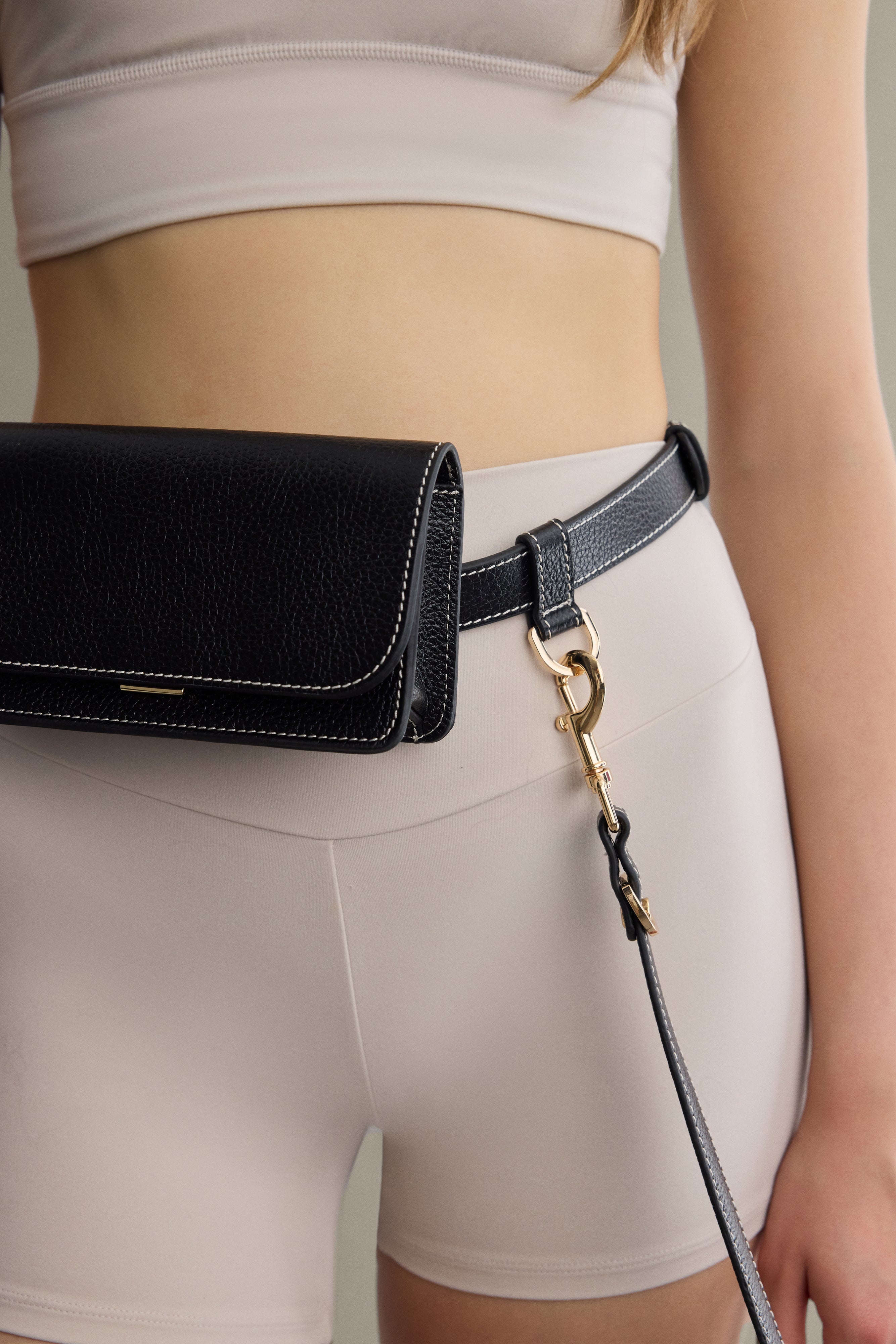 Arvak + Sól Belt Bag featuring a sleek design with adjustable strap and compact storage, ideal for everyday use.