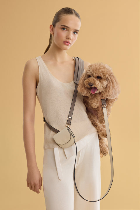 Hands-free leash and folding wallet from Arvak + Sól, featuring compact design and durable materials, displayed on a neutral background.