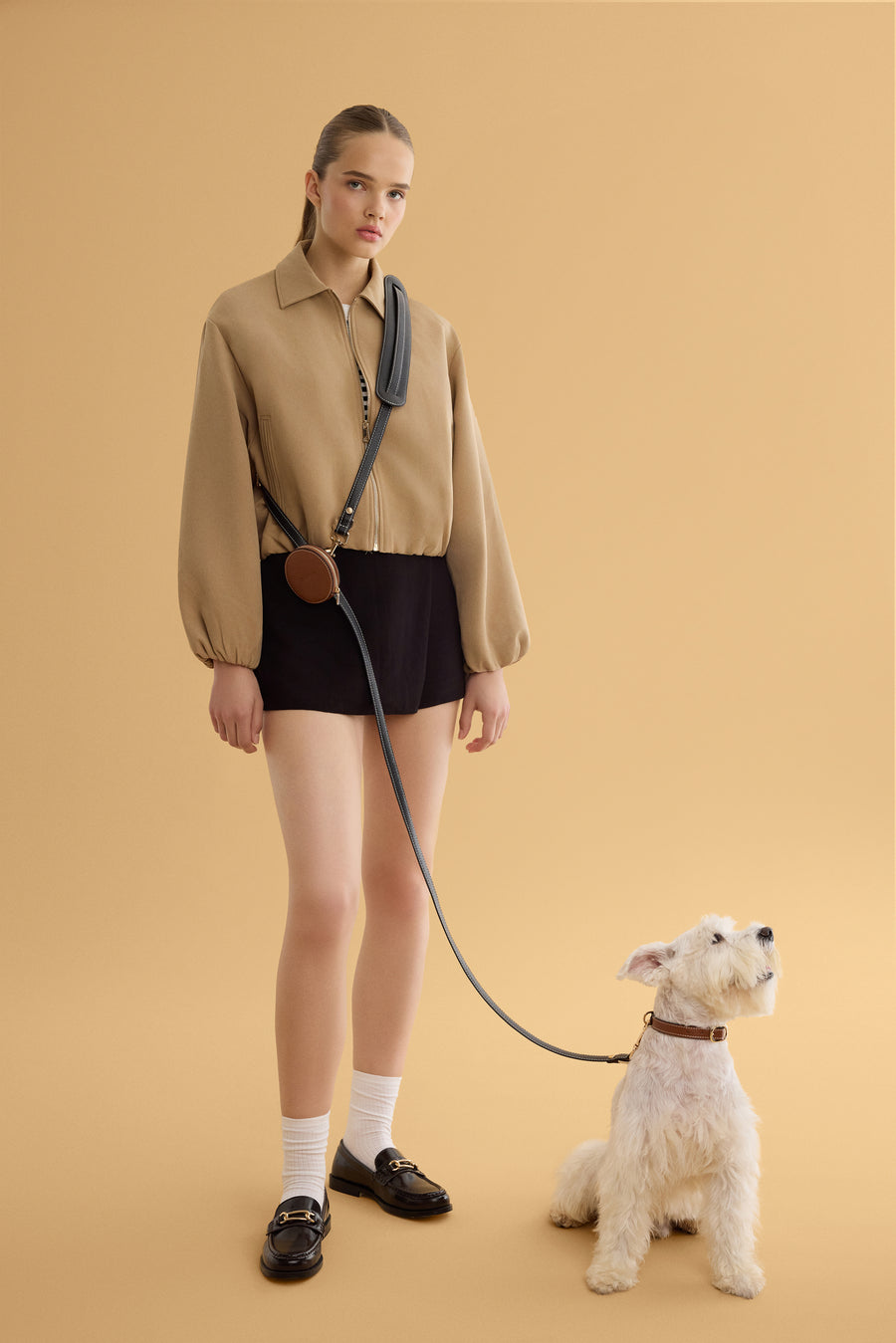 Hands free cross body leash by Arvak + Sól featuring a secure strap and clip, ideal for walking pets comfortably.