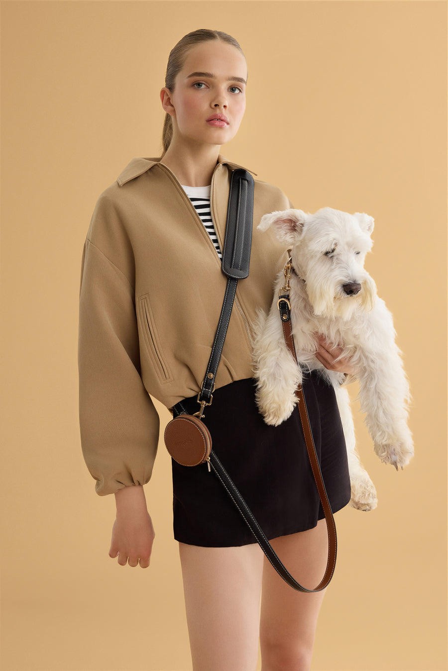 Hands free cross body leash by Arvak + Sól, showing adjustable strap and secure clip for active dog walking.