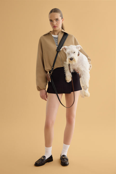 Hands-free leash and folding wallet from Arvak + Sól, featuring a compact wallet and adjustable leash for convenient outdoor use.