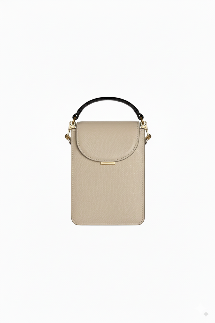 Cream-colored Arvak + Sól Micro Bag made of soft material, featuring a compact design with a sleek, minimalist style.